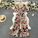 Macacão Feminino Floral com Decote V, Mangas Dolman e Cintura Ajustada – Elegância e Conforto