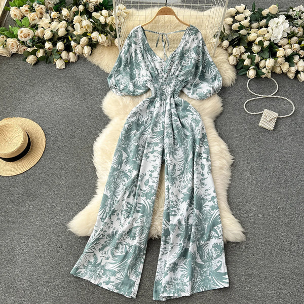 Macacão Feminino Floral com Decote V, Mangas Dolman e Cintura Ajustada – Elegância e Conforto