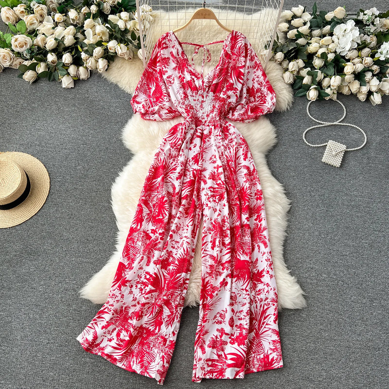 Macacão Feminino Floral com Decote V, Mangas Dolman e Cintura Ajustada – Elegância e Conforto