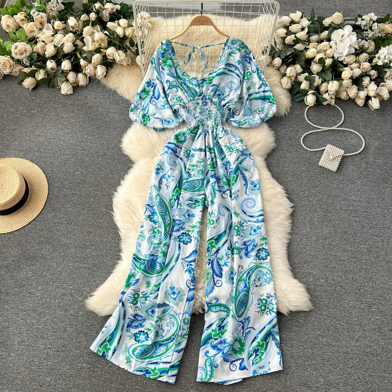 Macacão Feminino Floral com Decote V, Mangas Dolman e Cintura Ajustada – Elegância e Conforto