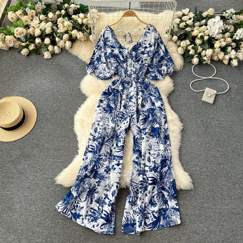 Macacão Feminino Floral com Decote V, Mangas Dolman e Cintura Ajustada – Elegância e Conforto