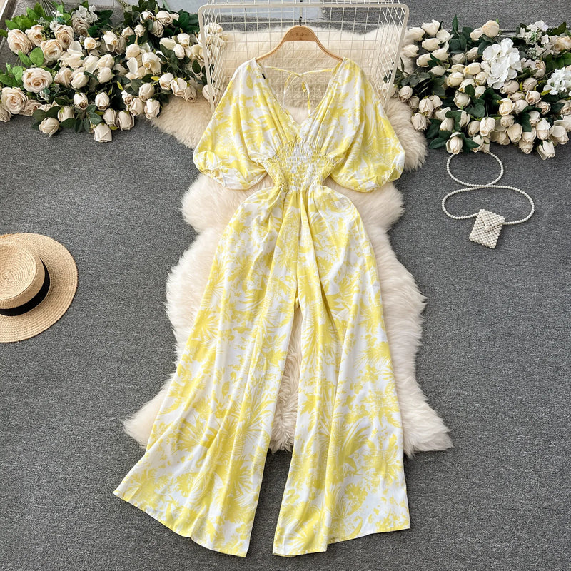 Macacão Feminino Floral com Decote V, Mangas Dolman e Cintura Ajustada – Elegância e Conforto