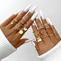 Conjunto com 58 Anéis Vintage – Corações, Cobras e Borboletas em Dourado