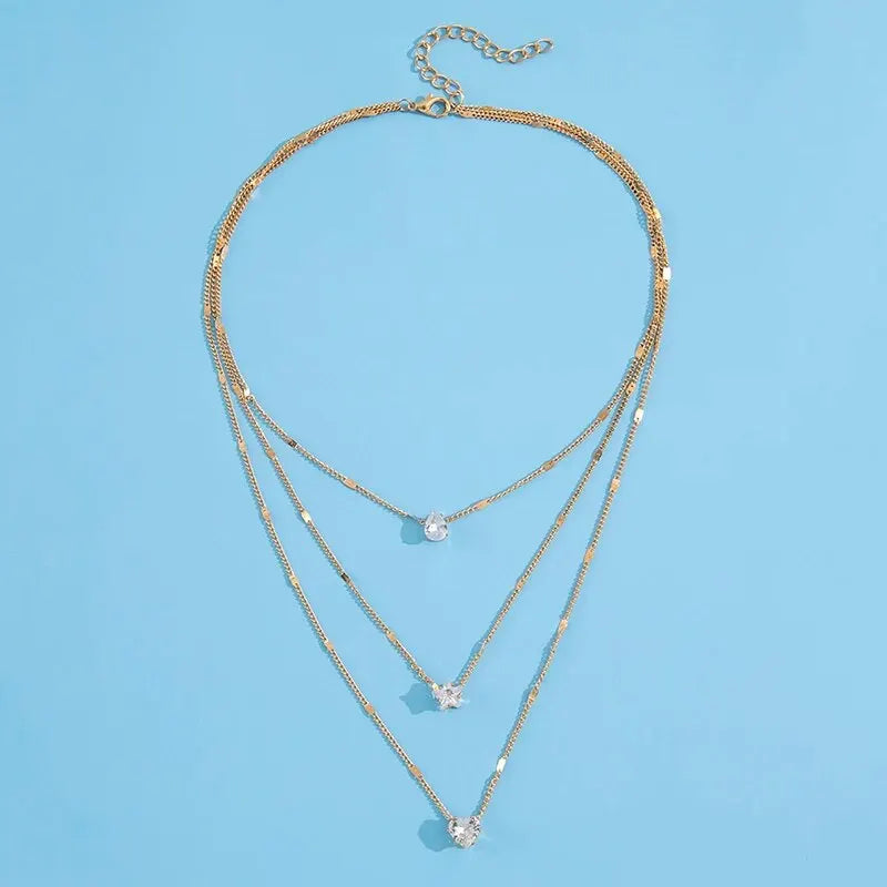 Colar Feminino Delicado Multicamadas com Pingente de Coração, Estrela e Gota – Presente Charmoso