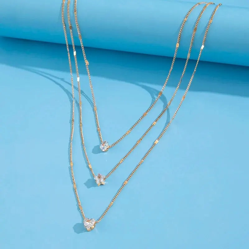 Colar Feminino Delicado Multicamadas com Pingente de Coração, Estrela e Gota – Presente Charmoso