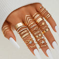 Conjunto com 58 Anéis Vintage – Corações, Cobras e Borboletas em Dourado